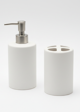 Matte white ceramic bathroom accessories set on white background