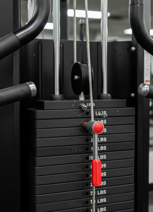 Close-up of chest press handles and weight stack