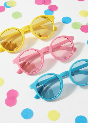 Retro round festival sunglasses with colorful tinted lenses in multiple colors