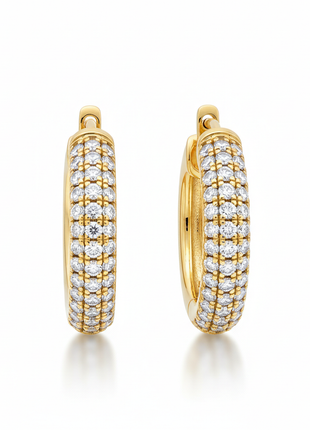 Women's diamond pavé gold hoop earrings on white background