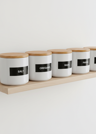 6-piece ceramic spice jar set with bamboo lids on kitchen shelf