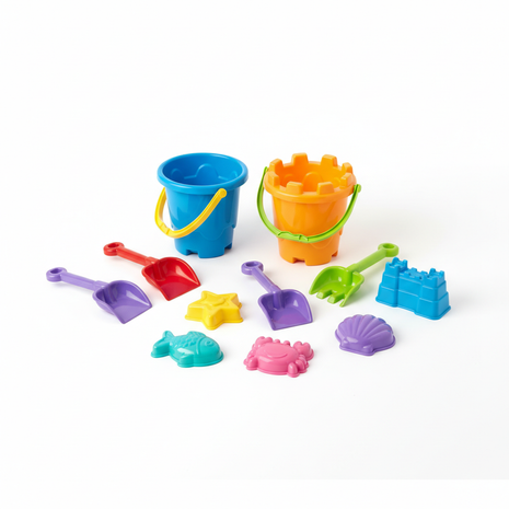 Colorful beach toy set with buckets shovels and sand molds