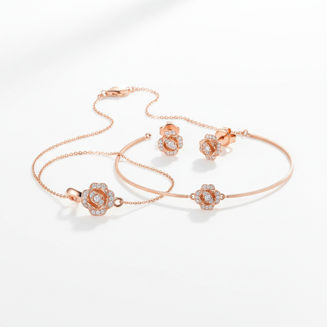 Women's rose gold floral necklace, earrings and bracelet set