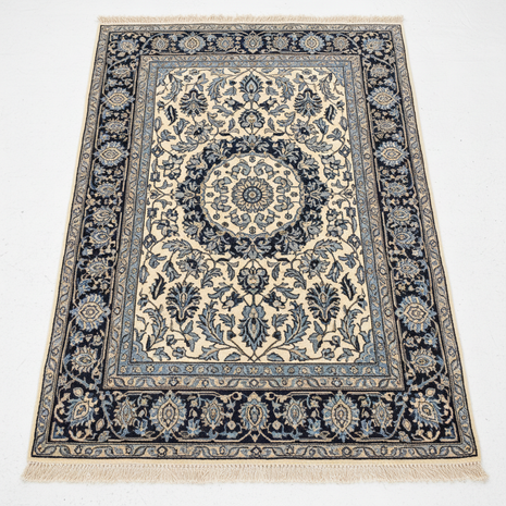 Persian Medallion Area Rug in navy blue and ivory