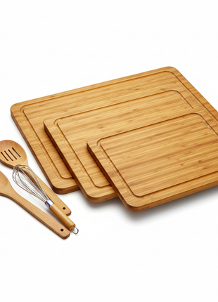 Bamboo cutting board set of 3 sizes with juice grooves on white background